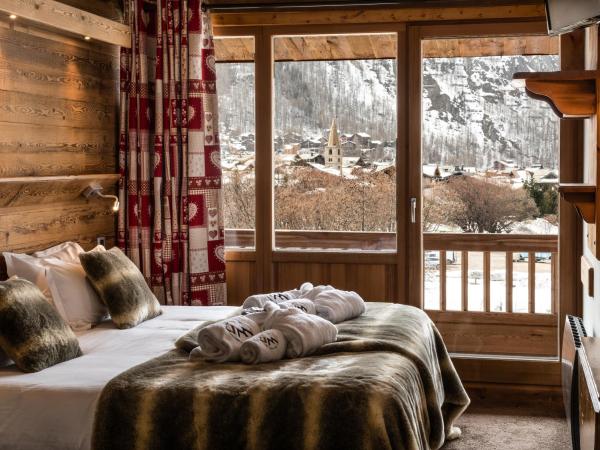 Hôtel Ski Lodge - Chambres & Appartements - Village Montana, Rezervasyon Otel Rhône-Alps Otoparklı Oteller, Otopark