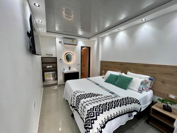 HOTEL TORRE DELUXE ¨SANTORINI¨, Rezervasyon  Antioquia otoparklı oteller, Otopark