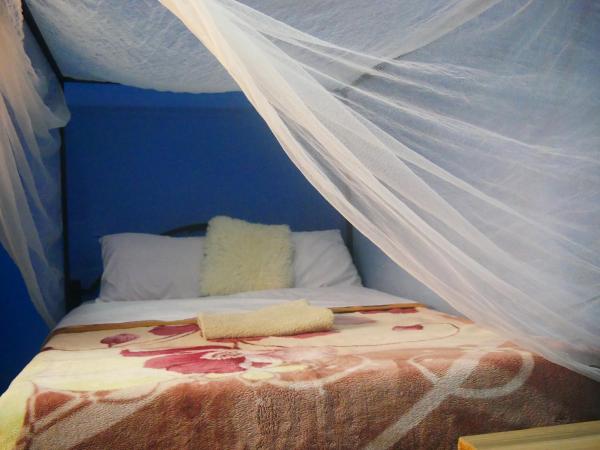 The Peaceful Den, Rezervasyon  Ololaimutiek 