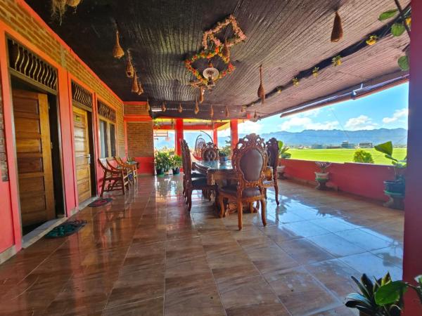 Penginapan Bunga Sonsang kamar Family Tripel, Rezervasyon  Sungaidaras Sumatra