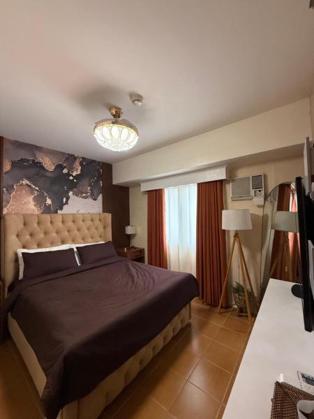 Serene Stay Woodlands 2BR, Rezervasyon  Manila 