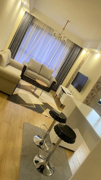 spacious executive one bedroom apartments with breathtaking city views swimming pool ,well equipped gym ,child playground and ample parking space, Rezervasyon Daire Nairobi Nairobi