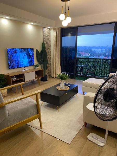 urban loft retreat apartment with fully equipped gym ,heated swimming pool, private parking and relaxing rooftop with breath taking views, Rezervasyon Daire Nairobi Nairobi