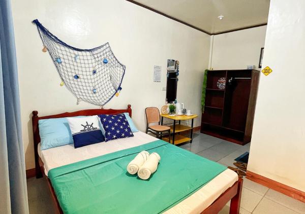 Comfortable Studio Near the Beach and Town Center with Free Parking by Bantayan Paw and Palm Stays, Rezervasyon  Pooc Visayas