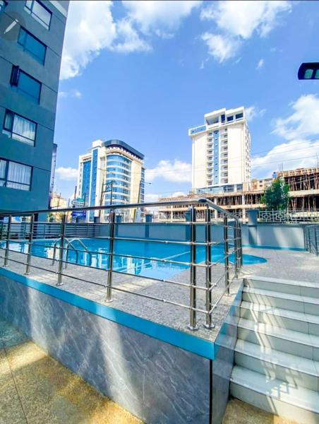 classy executive one bedroom apartment with swimming pool, fully equipped gym ample parking space and amazing scenic views, Rezervasyon Daire Nairobi Nairobi
