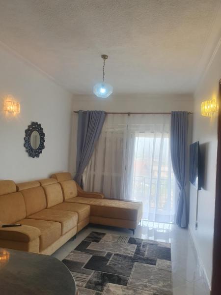Two Bedrooms Apartment, located between kajjansi and kitende, with one bathroom, a living room, fully furnished kitchen, patio, free wifi, free parking space, Rezervasyon Daire Busiiro Apartlar, Daire